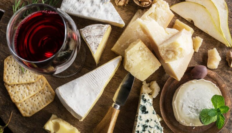 Cheese,Platter,With,Organic,Cheeses,,Fruits,,Nuts,And,Wine,On